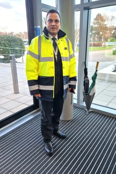 Commercial manned guarding UK by USSG security officer at corporate building entrance